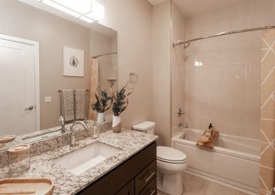 Apartment bathroom with tub and sink in an apartment at the Residences at Bentwood in Plymouth Meeting