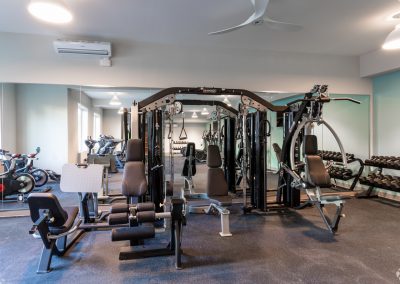 Weightlifting machines in the gym at Residences at Bentwood in Plymouth Meeting